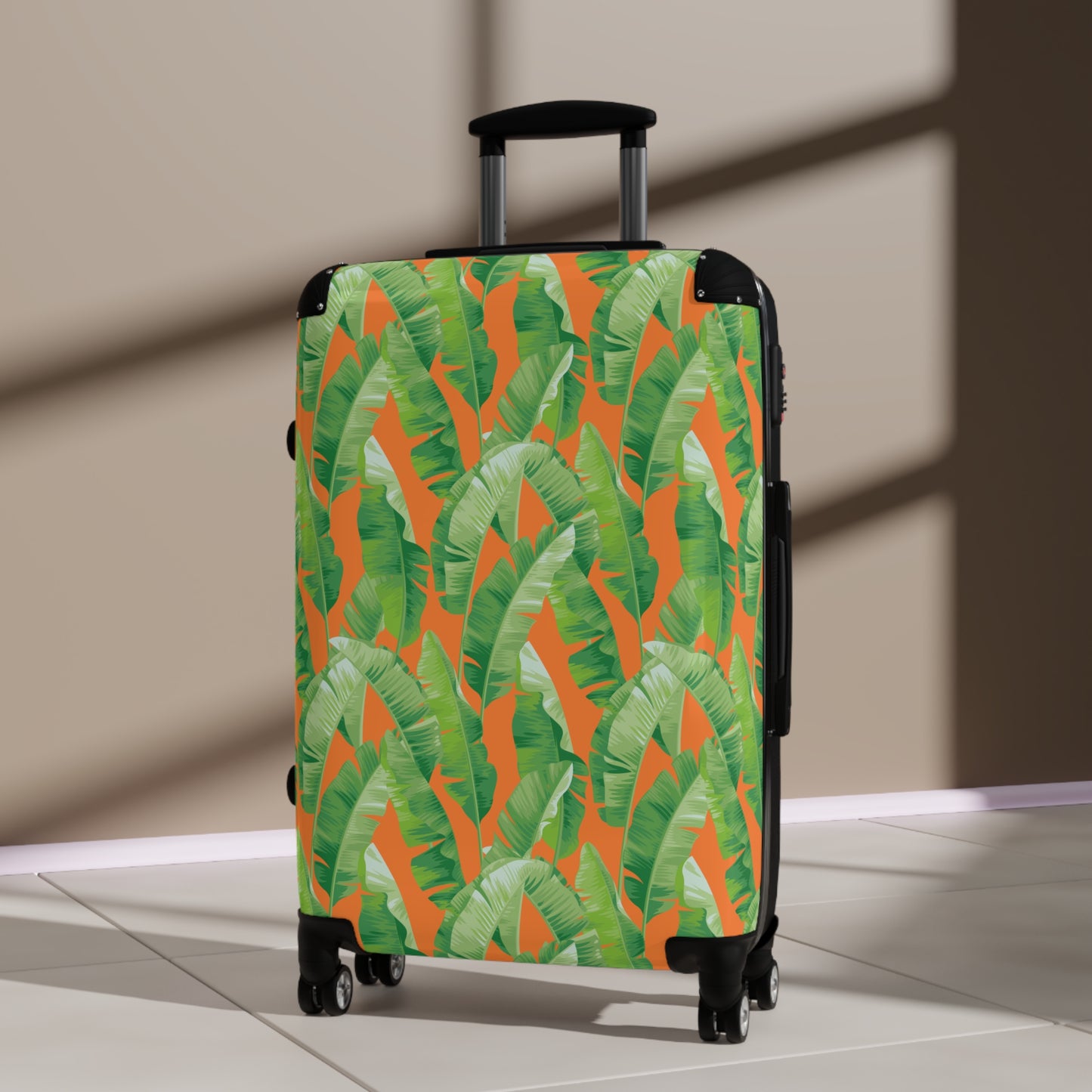 Banana Leaf on Orange Suitcases
