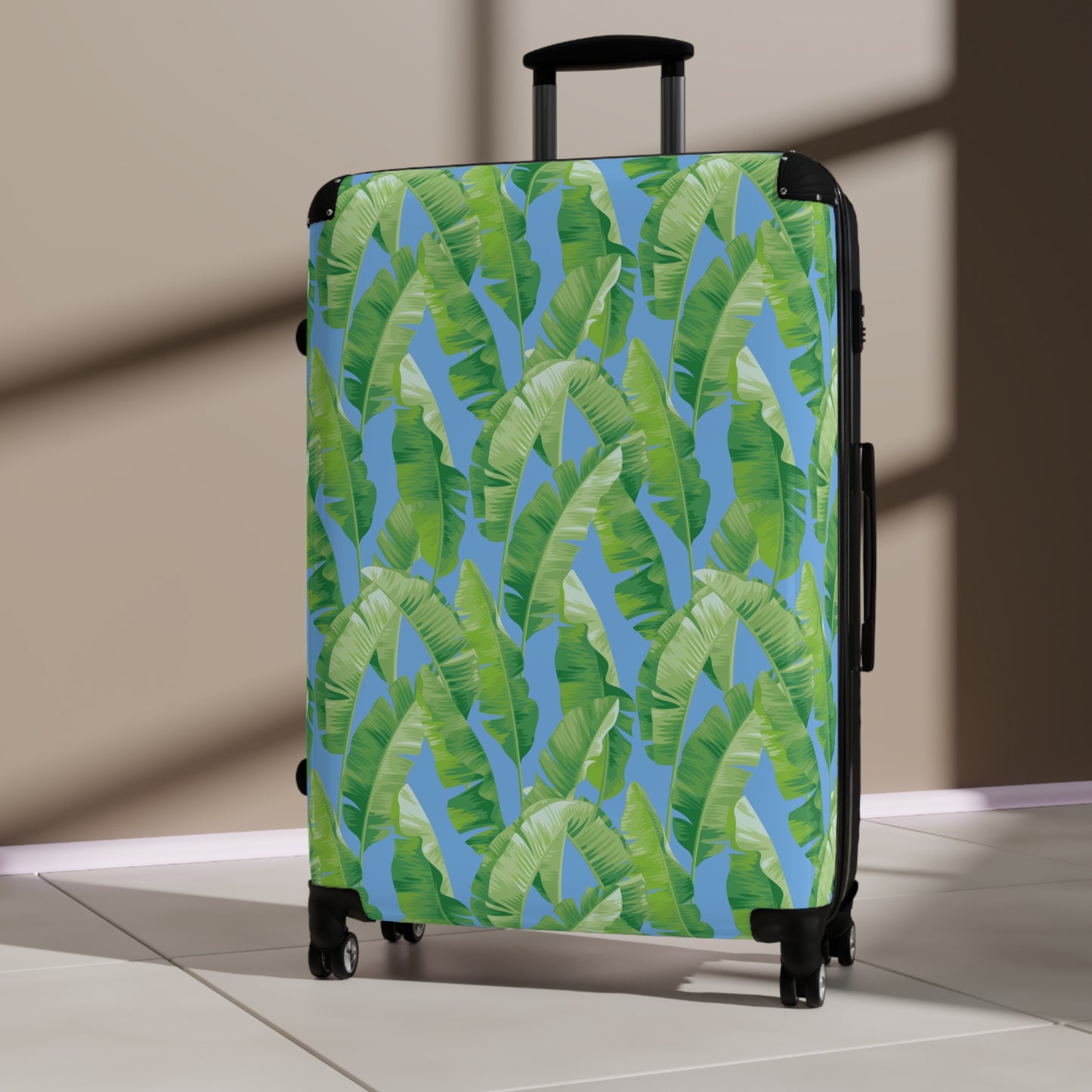 Banana Leaf on Blue Suitcases