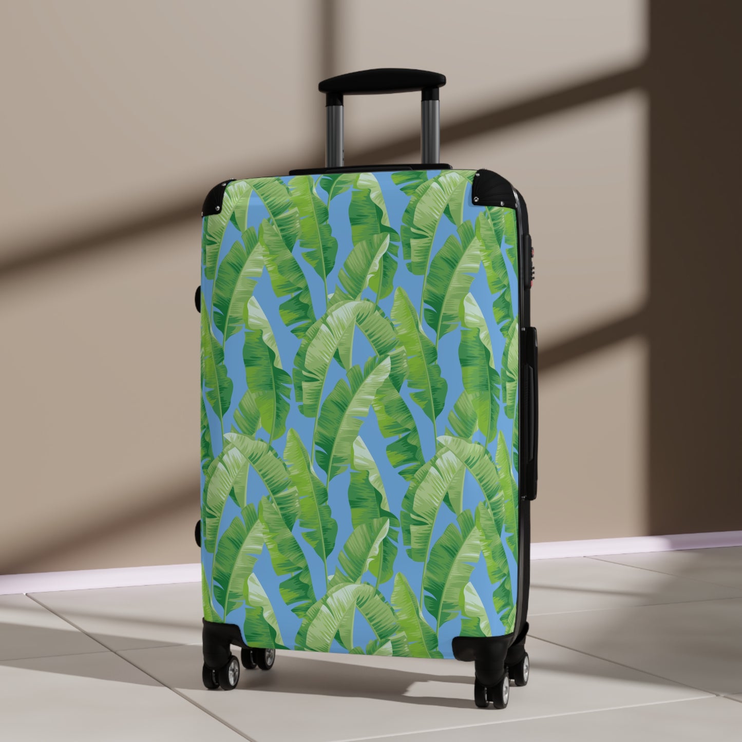 Banana Leaf on Blue Suitcases